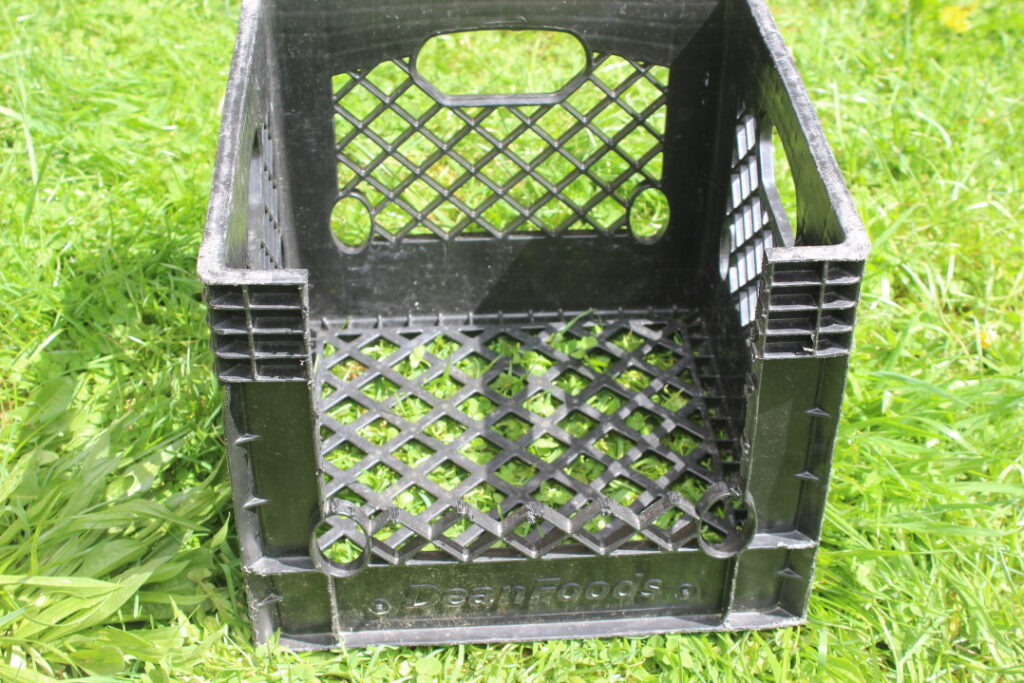 Nesting box made from a plastic crate.