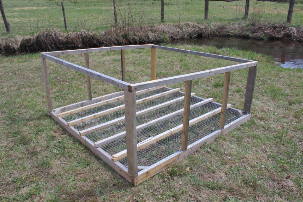 Adding side posts to a mobile chicken coop.