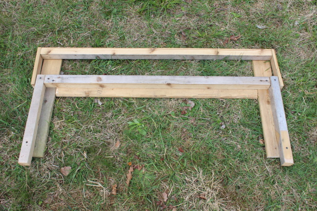 A swivel landing bar for a mobile chicken coop.
