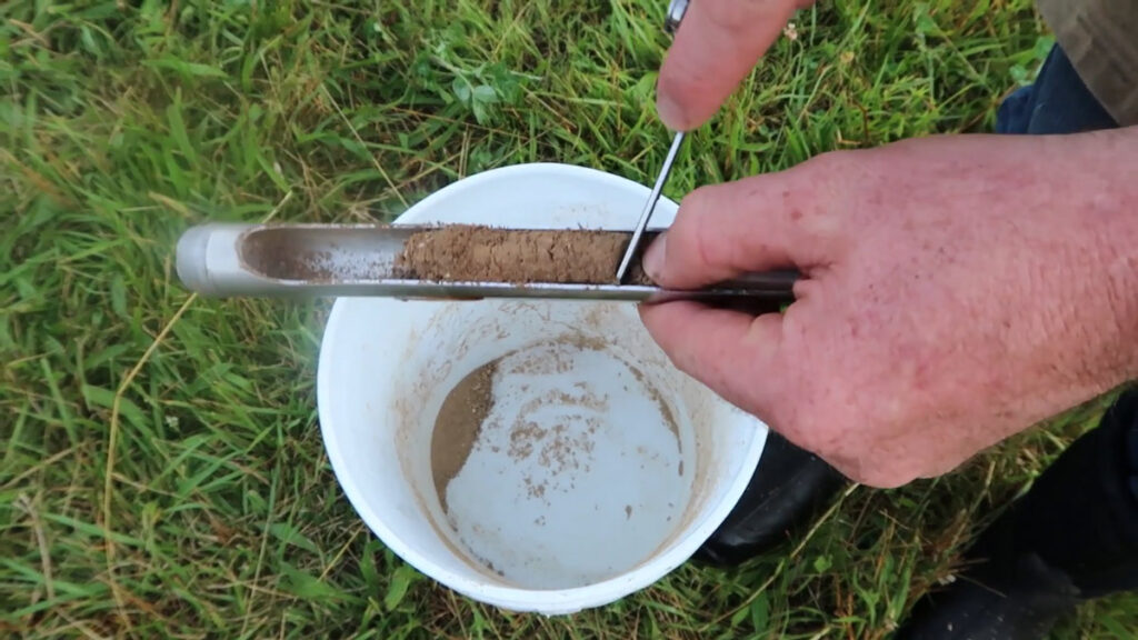 Soil probe with a soil sample.